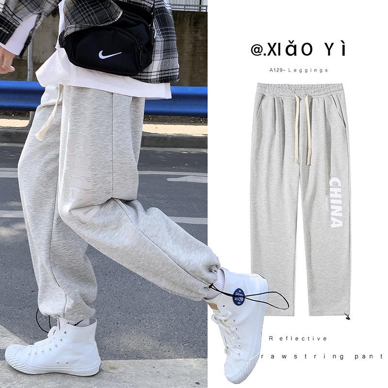 Autumn and Winter solid color printing sports casual ankle pants men and teenagers loose drawstring straight pants men, Black
Autumn and Winter solid color printing sports casual ankle pants men and teenagers loose drawstring straight pants men, Black