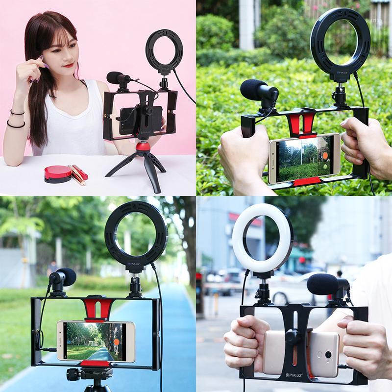 4 in 1 Vlogging Live Broadcast Smartphone Video Rig +4.6 inch LED Selfie Ring Light & Microphone +Tripod Mount+Tripod Head1
4 in 1 Vlogging Live Broadcast Smartphone Video Rig +4.6 inch LED Selfie Ring Light & Microphone +Tripod Mount+Tripod Head1