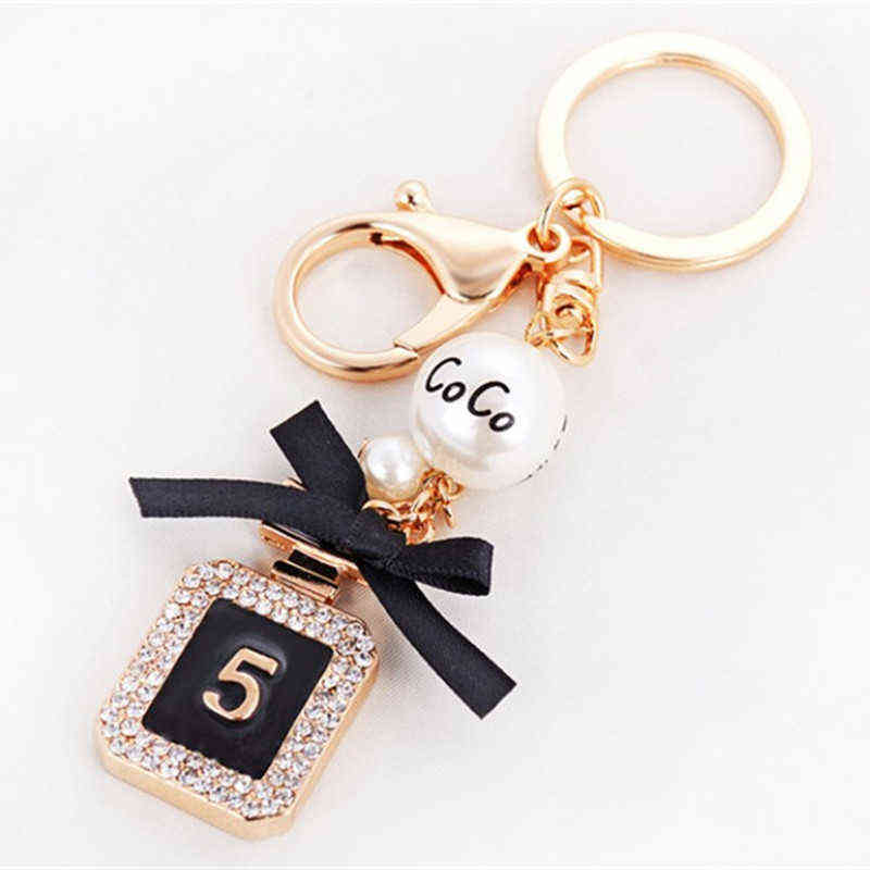 Brand Perfume Bottle Keychain Luxury Key Chain Fashion Key Ring Holder Keyrings Women Souvenirs Car Bag Charm Pendant Y0113, Silver
Brand Perfume Bottle Keychain Luxury Key Chain Fashion Key Ring Holder Keyrings Women Souvenirs Car Bag Charm Pendant Y0113, Silver