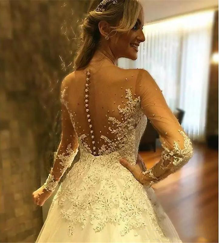 2022 Exquisite Long Sleeves A Line Wedding Dresses Bridal Gowns Sexy Sheer Back Buttons Appliques Lace Pearls Beaded Spring Tulle Garden Bride Dress P