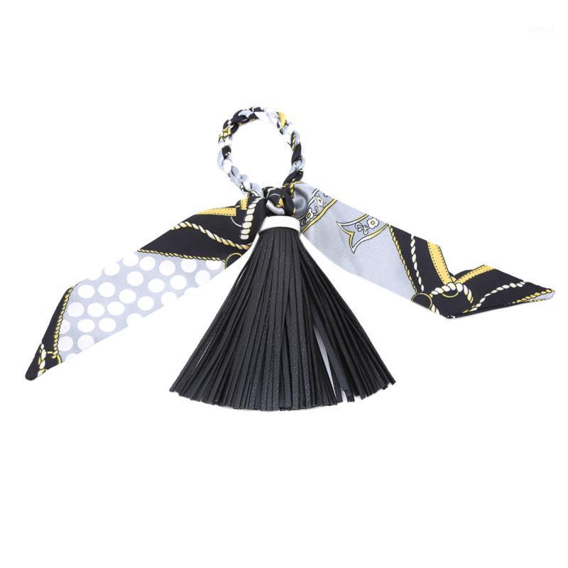 New Fashion PU Leather Pony Tassels Bag Charms With Scarfs For Handbag Decoration Keychains Fabric 44g Bag Parts Accessories1
New Fashion PU Leather Pony Tassels Bag Charms With Scarfs For Handbag Decoration Keychains Fabric 44g Bag Parts Accessories1