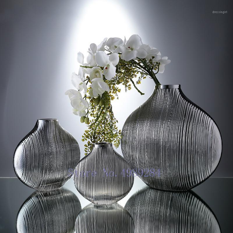 Nordic Creative Transparent glass vase Decorative ornaments Flower arrangement accessories Modern home decoration wedding vase1
Nordic Creative Transparent glass vase Decorative ornaments Flower arrangement accessories Modern home decoration wedding vase1