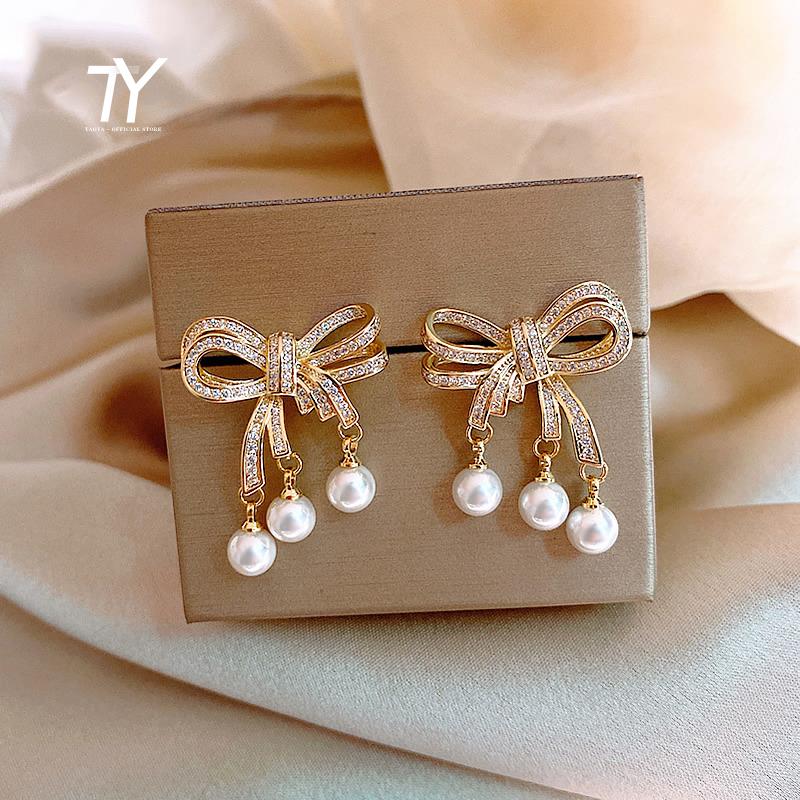Dangle & Chandelier Heavy Industry Luxury Zircon Pearl Bow Earrings Elegant Women Jewelry Fashion Party Temperament Ladies Christmas
Dangle & Chandelier Heavy Industry Luxury Zircon Pearl Bow Earrings Elegant Women Jewelry Fashion Party Temperament Ladies Christmas