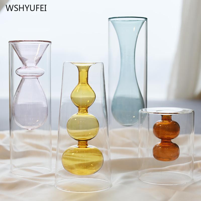 Nordic modern simple stained glass transparent creative double-layer glass transparent vase decoration art personality flower
Nordic modern simple stained glass transparent creative double-layer glass transparent vase decoration art personality flower