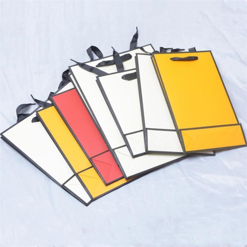 10pcs/lot Christmas Beige Gift Bag Orange Jewelry Paper Bag Red Portable Clothes Scarf Universal Package With Black Frame1
10pcs/lot Christmas Beige Gift Bag Orange Jewelry Paper Bag Red Portable Clothes Scarf Universal Package With Black Frame1