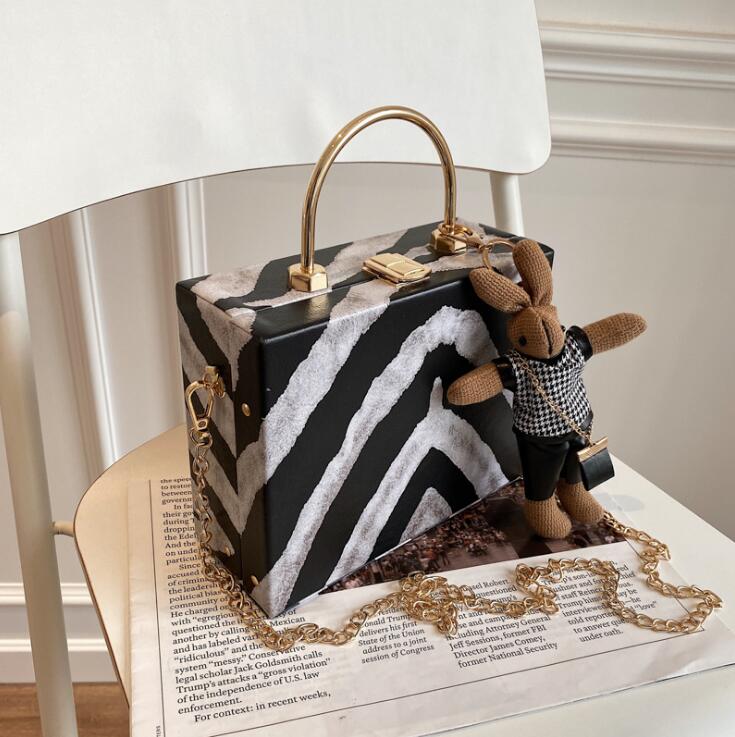Factory wholesale women bag cute cartoon pendant womens hard box chain bags zebra leather handbag street trend leathers shoulder handbags