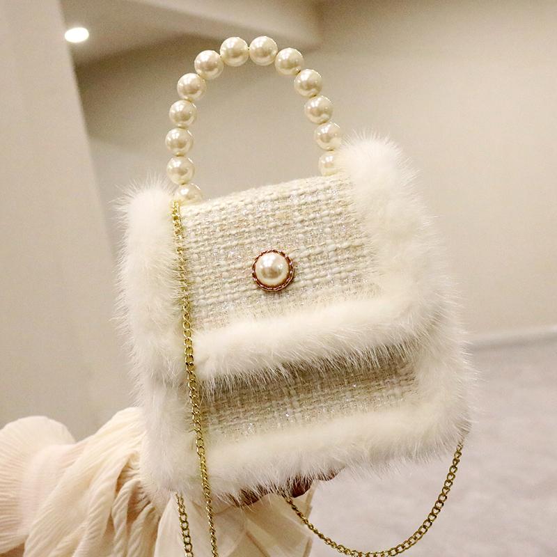 Pearl Tote bag 2021 Fashion New High Quality Wool Women's Designer Handbag Chain Shoulder Messenger Bag Phone Purses, Black
Pearl Tote bag 2021 Fashion New High Quality Wool Women's Designer Handbag Chain Shoulder Messenger Bag Phone Purses, Black