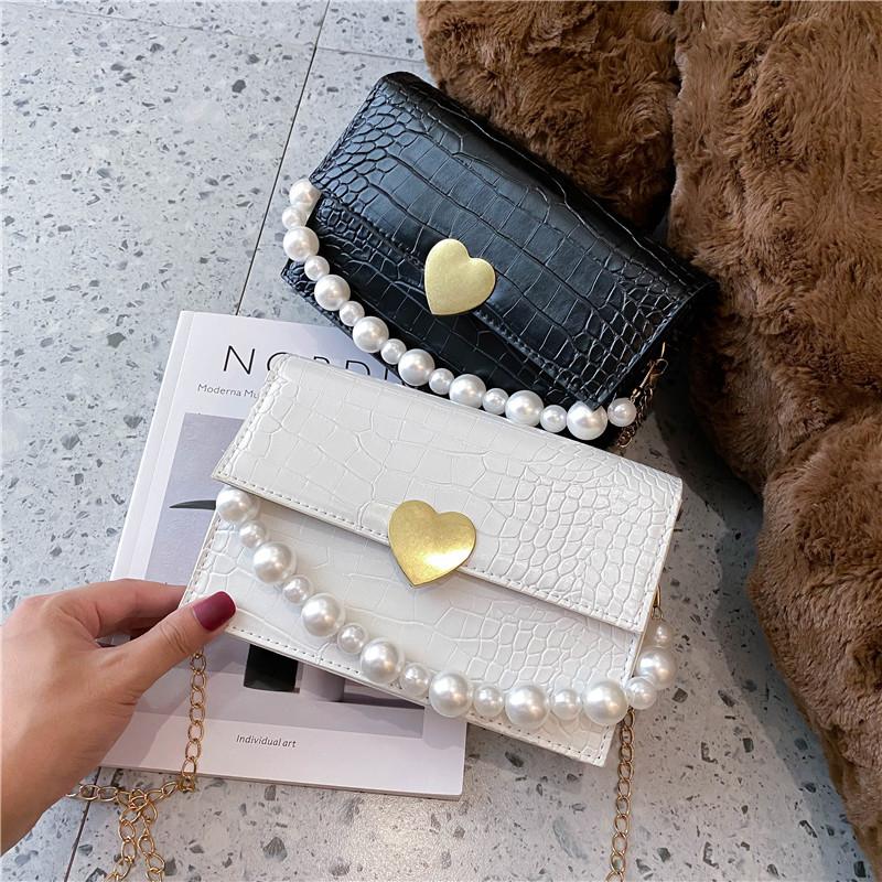 Summer bag bag girl 2021 new fashion fashion popular pearl handbag ocean air single shoulder oblique side, Black
Summer bag bag girl 2021 new fashion fashion popular pearl handbag ocean air single shoulder oblique side, Black