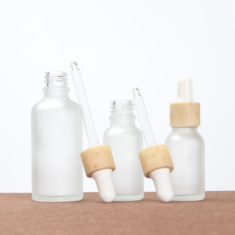Frosted Glass Dropper Bottles Essential Oil Bottles with Imitated Bamboo Lids Refillable Essential Liquid Cosmetic Containers
Frosted Glass Dropper Bottles Essential Oil Bottles with Imitated Bamboo Lids Refillable Essential Liquid Cosmetic Containers