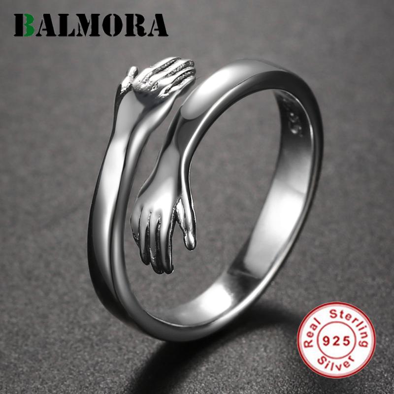 BALMORA Real 925 Sterling Silver Hug Hands Stacking Ring For Women Fashion Statement Punk Ring Adjustable Hugging Jewelry
BALMORA Real 925 Sterling Silver Hug Hands Stacking Ring For Women Fashion Statement Punk Ring Adjustable Hugging Jewelry