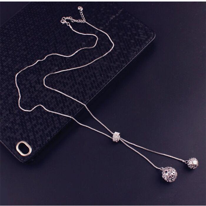 Fashion all-match new hollow ball necklace female simple long tassel sweater chain accessories hot sale
Fashion all-match new hollow ball necklace female simple long tassel sweater chain accessories hot sale