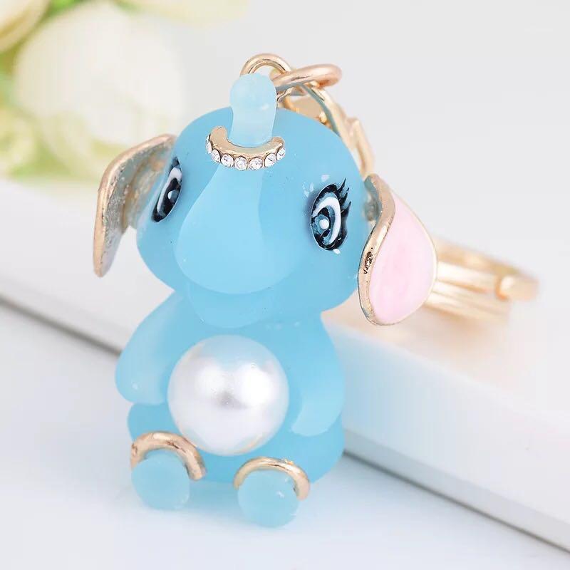 New fashion Creative Pearl Elephant Keychains Cute Elephant Car Key ring Female Bags Pendant Accessories key chain1
New fashion Creative Pearl Elephant Keychains Cute Elephant Car Key ring Female Bags Pendant Accessories key chain1