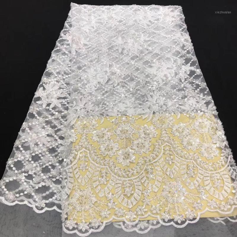 Luxury white French sequined lace fabric 2020 high quality embroidered African handmade beaded lace fabric Nigerian gown1
Luxury white French sequined lace fabric 2020 high quality embroidered African handmade beaded lace fabric Nigerian gown1