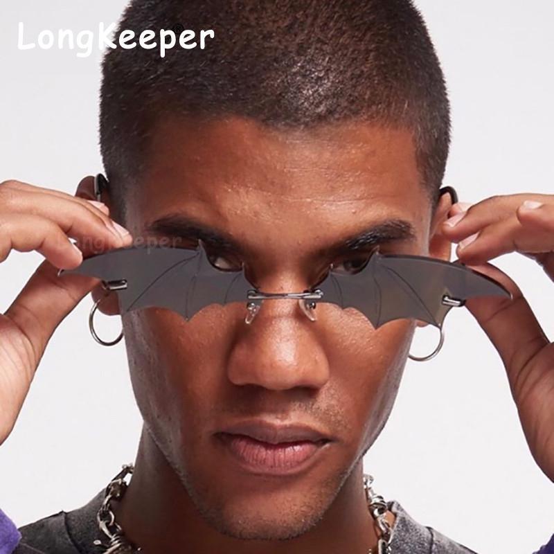 Fashion Bat Vintage 2020 New Sunglasses Women Mirror Retro Rimless Sun glasses Men Frameless Trend Cat Eye Small glasses Eyewear1
Fashion Bat Vintage 2020 New Sunglasses Women Mirror Retro Rimless Sun glasses Men Frameless Trend Cat Eye Small glasses Eyewear1