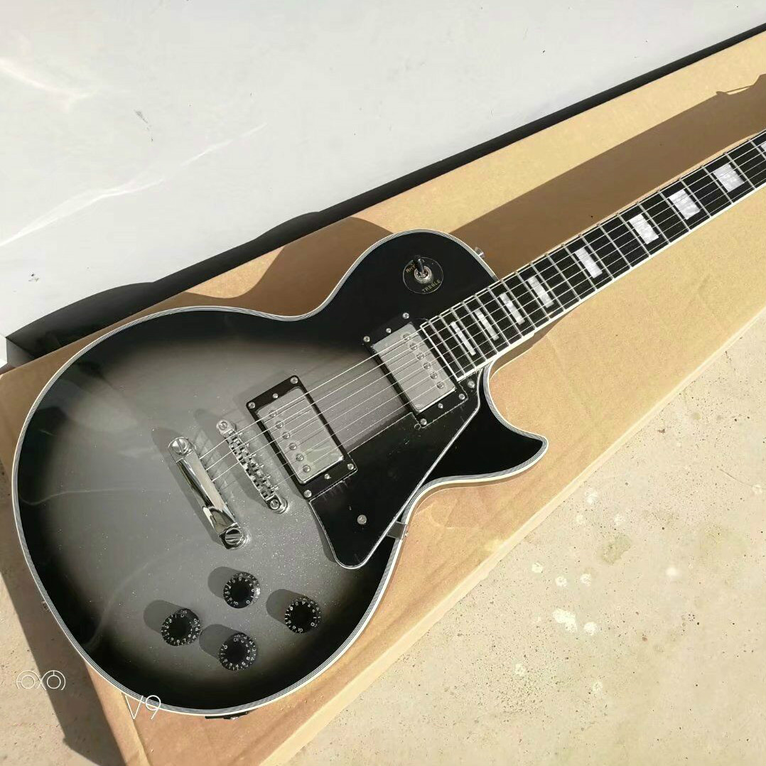 Top quality low price GYLP-30401 silver burst color solid body balck pickguard Art pearl inlay rosewood fretboard LP Electric Guitar
Top quality low price GYLP-30401 silver burst color solid body balck pickguard Art pearl inlay rosewood fretboard LP Electric Guitar