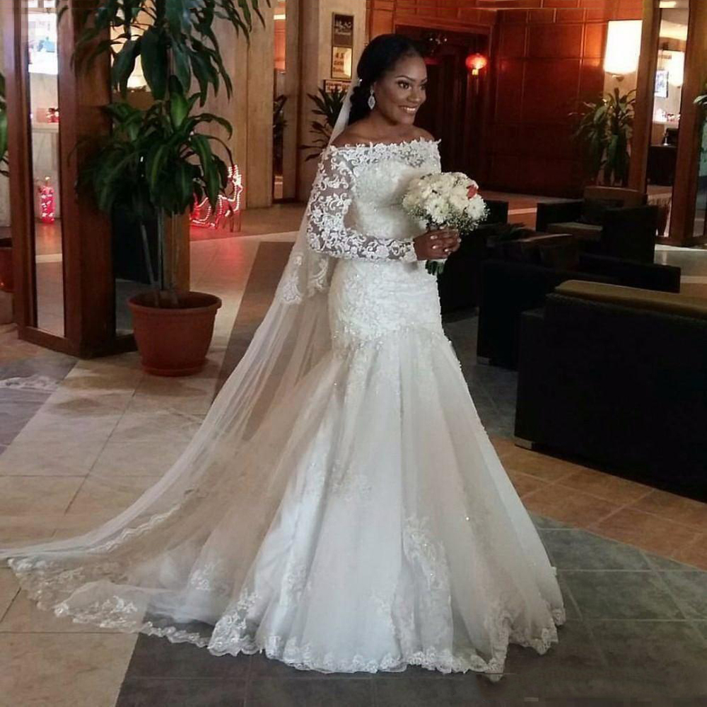 African Long Sleeves Lace Mermaid Wedding Dresses with Beaded Appliques Bateau Neck Court Train Tulle Bridal Gowns, White
African Long Sleeves Lace Mermaid Wedding Dresses with Beaded Appliques Bateau Neck Court Train Tulle Bridal Gowns, White