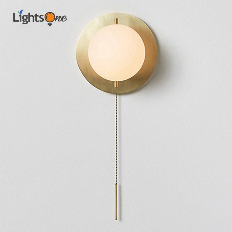 Postmodern minimalist American designer glass round wall lamp personality living room bedroom corridor brass wall light
Postmodern minimalist American designer glass round wall lamp personality living room bedroom corridor brass wall light