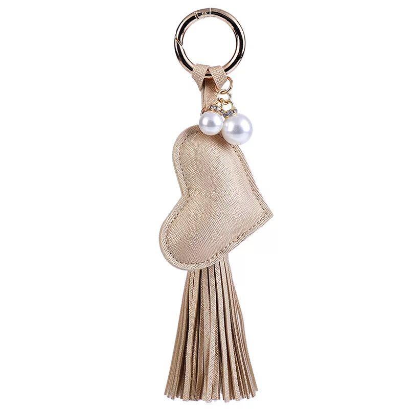 Creative PU leather tassel key chain lovely love bag pendant couple car key ring fashion gifts charm ornaments keychain
Creative PU leather tassel key chain lovely love bag pendant couple car key ring fashion gifts charm ornaments keychain