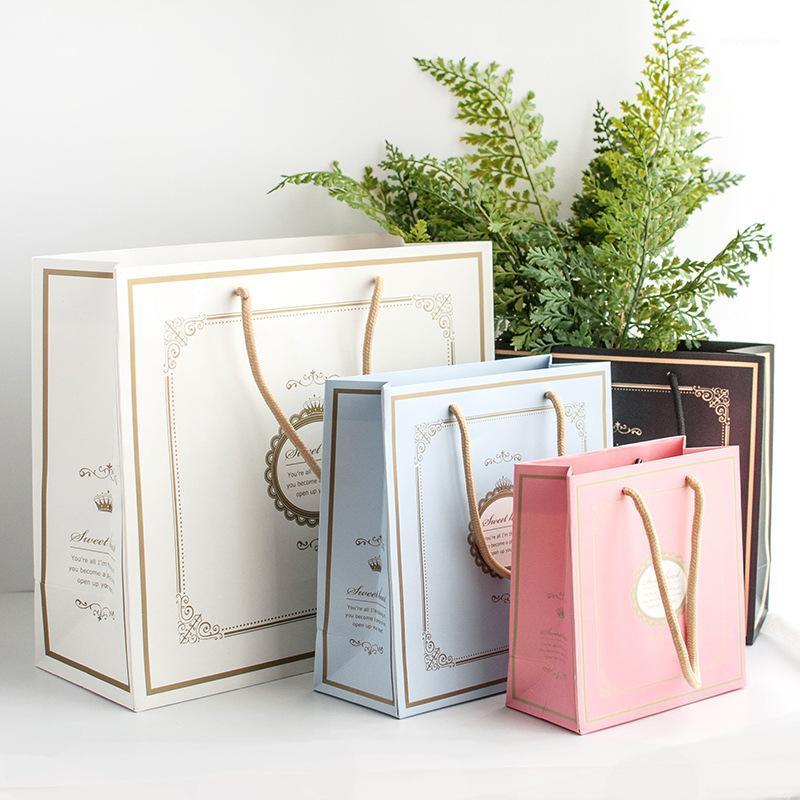 Present Box For Clothes Books Packaging Paper Box Bags English Print Kraft Paper Gift Bag for Wedding Party Decoration1
Present Box For Clothes Books Packaging Paper Box Bags English Print Kraft Paper Gift Bag for Wedding Party Decoration1