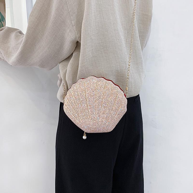 shell bags for women 2019 evening sequins handbags lady mini chain shoulder bag girl pearl pendant crossbody bag1, Beige
shell bags for women 2019 evening sequins handbags lady mini chain shoulder bag girl pearl pendant crossbody bag1, Beige
