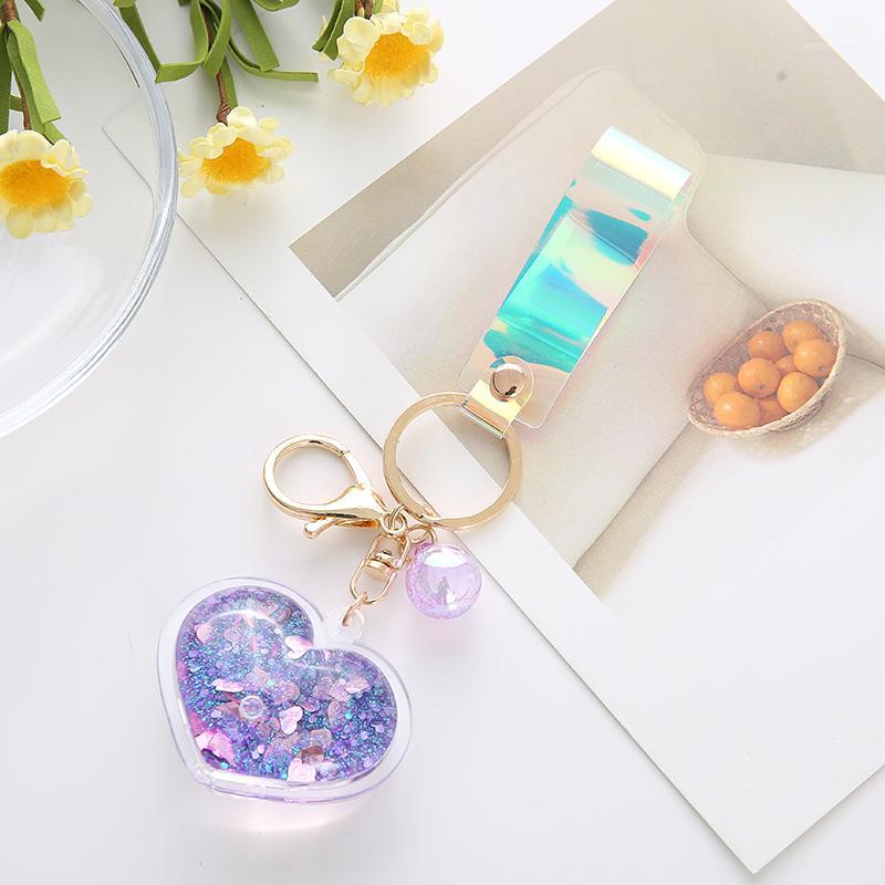 Creative Acrylic Into Quicksand Oil Bottle Love Heart Key chain Flash Peach for Women Car Keychain Bag Pendant EH1271
Creative Acrylic Into Quicksand Oil Bottle Love Heart Key chain Flash Peach for Women Car Keychain Bag Pendant EH1271