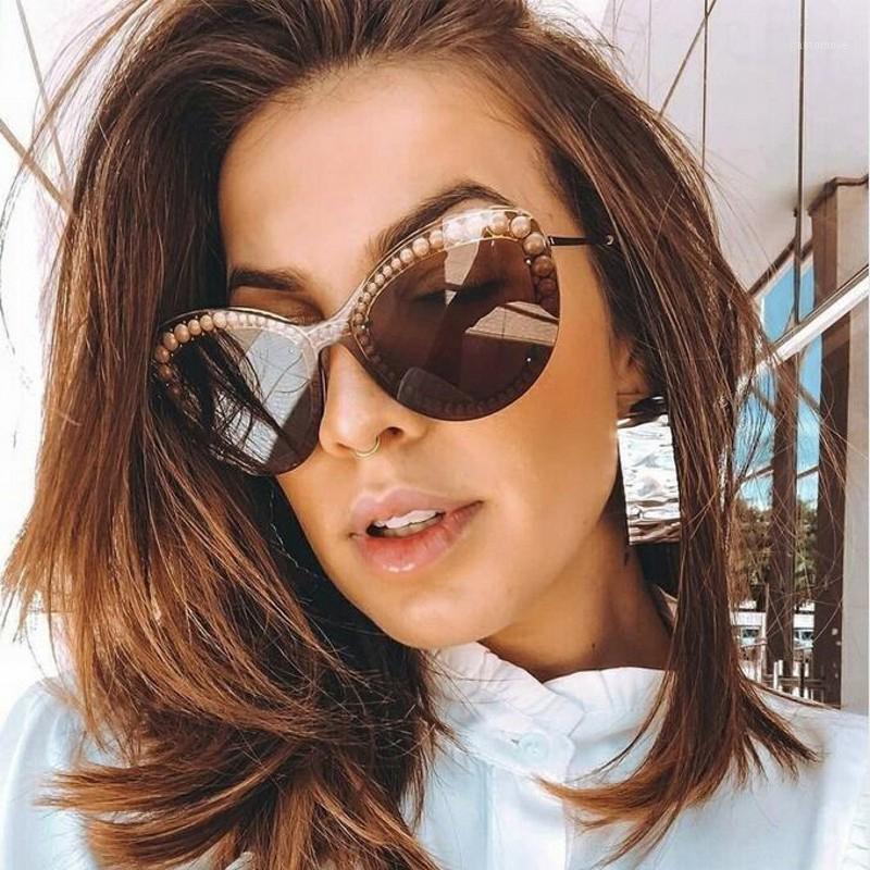 luxury pearl rimless Women sunglasses Big Sexy Cat eye sunglasses Shades Fashion Clear lens Glasses sun1
luxury pearl rimless Women sunglasses Big Sexy Cat eye sunglasses Shades Fashion Clear lens Glasses sun1