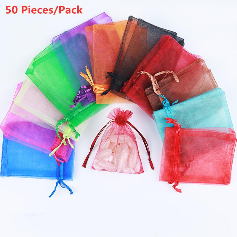 50pcs/Pack 7cmx9cm Organza Gift Bags Drawstring Pouches Jewelry Packaging Bag Candy Bag for Wedding Party Favors Xmas Decoration
50pcs/Pack 7cmx9cm Organza Gift Bags Drawstring Pouches Jewelry Packaging Bag Candy Bag for Wedding Party Favors Xmas Decoration