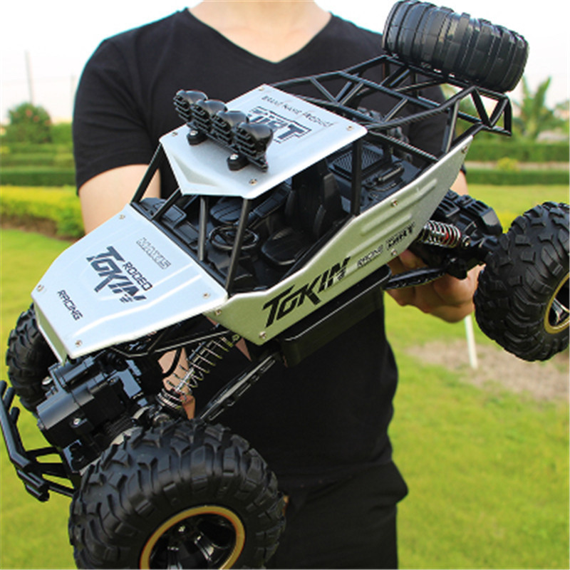28cm RC 1/16 4WD 4x4 Driving Double Motors Drive Bigfoot Remote Control Car Model Off-Road Vehicle Toy 201105
28cm RC 1/16 4WD 4x4 Driving Double Motors Drive Bigfoot Remote Control Car Model Off-Road Vehicle Toy 201105
