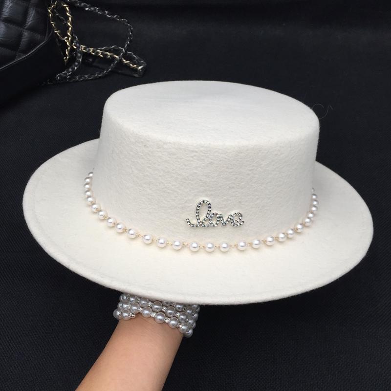 in the spring and autumn winter new pearls diamond flat temperament wool white hat for women, Black
in the spring and autumn winter new pearls diamond flat temperament wool white hat for women, Black
