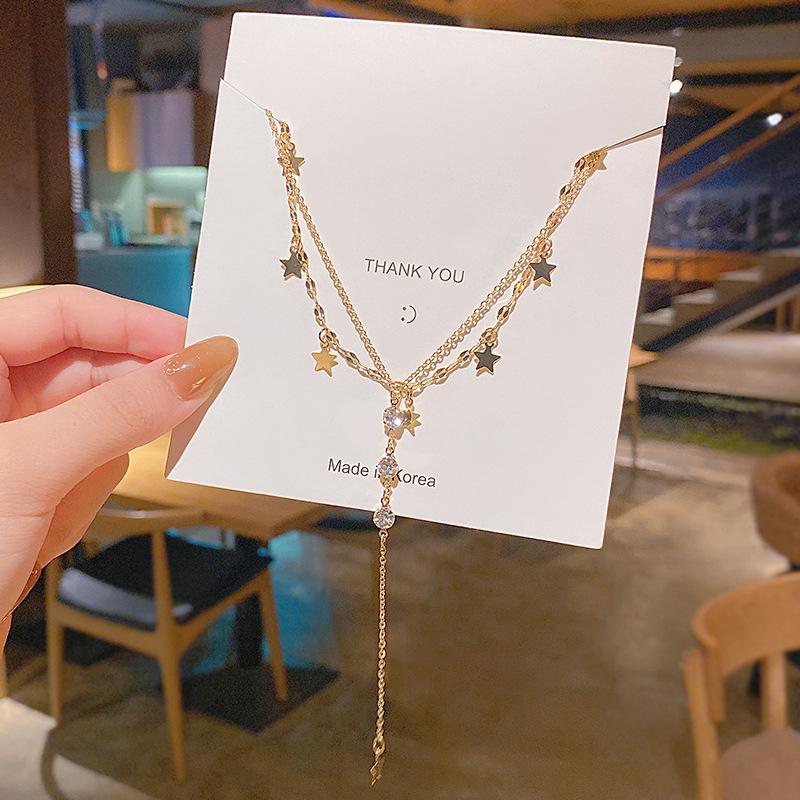 SNCSDK 2020 titanium steel double layer five-pointed star zircon tassel Women necklace design sense temperament clavicle chain
SNCSDK 2020 titanium steel double layer five-pointed star zircon tassel Women necklace design sense temperament clavicle chain