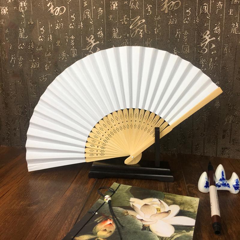 50 pcs/lot White Folding Elegant Paper Hand Fan Wedding Party Favors 21cm(white
50 pcs/lot White Folding Elegant Paper Hand Fan Wedding Party Favors 21cm(white