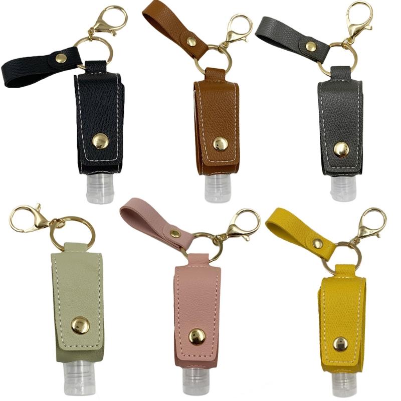 Travel Hand Sanitizer Empty Refillable Bottle with Faux Leather Holder Keychain
Travel Hand Sanitizer Empty Refillable Bottle with Faux Leather Holder Keychain