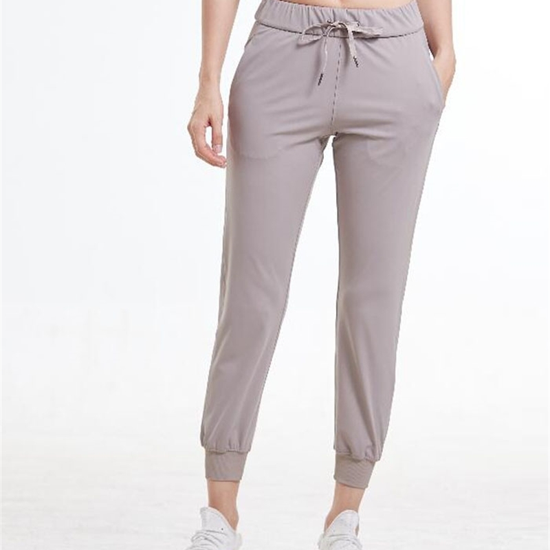 Women Stretch fabrics Loose Fit Sport Active skinny Leggings with two side pockets Ankle-Length Pants 201109
