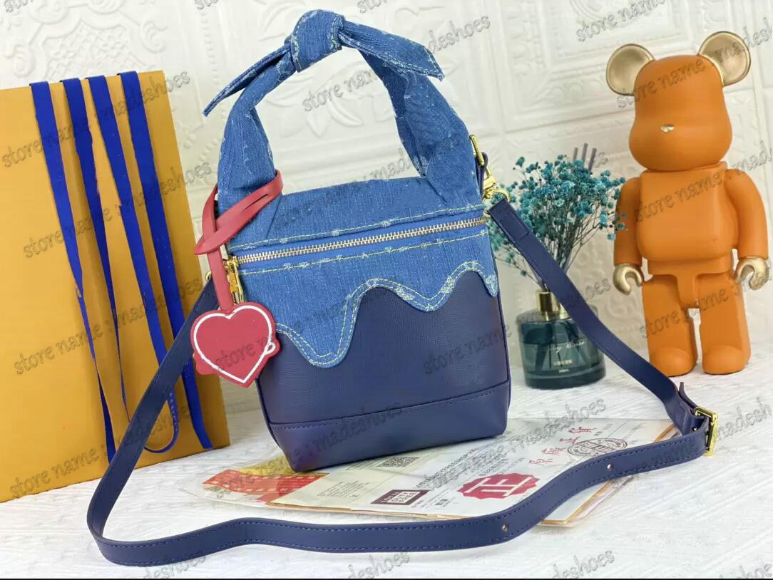 NIGO Japanese Cruiser M45970 Handle Bag Blue Monograms Denim and Navy Blue Taurillon leather Luxurys Designers Cross Body 2022 Capsule City bags
NIGO Japanese Cruiser M45970 Handle Bag Blue Monograms Denim and Navy Blue Taurillon leather Luxurys Designers Cross Body 2022 Capsule City bags