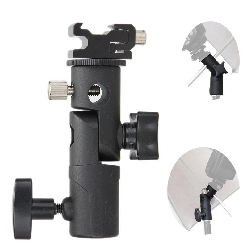 E Shape Universal Metal Flash Bracket Stand Hot Shoe Speedlite Umbrella Holder Umbrella Mount Adapter For Photo Studio
E Shape Universal Metal Flash Bracket Stand Hot Shoe Speedlite Umbrella Holder Umbrella Mount Adapter For Photo Studio