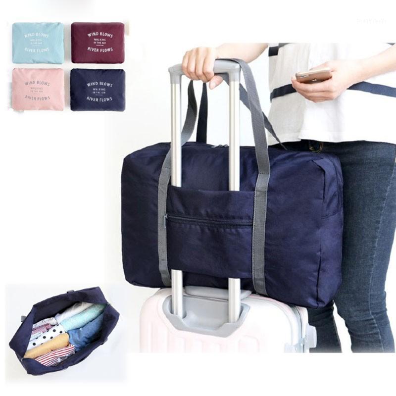 Large Capacity Travel Bag Men Women Foldable Waterproof Bags Hand Luggage Nylon Traveling Duffle Bags Folding Handbag Travel Bag1, Pink color
Large Capacity Travel Bag Men Women Foldable Waterproof Bags Hand Luggage Nylon Traveling Duffle Bags Folding Handbag Travel Bag1, Pink color