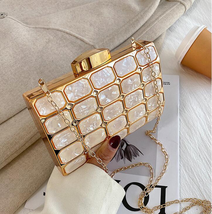 Factory wholesale women handbag elegant atmosphere studded clutch bag personality metal hard box dinner handbags Joker fashion acrylic chain bags, Black(boutique box)
Factory wholesale women handbag elegant atmosphere studded clutch bag personality metal hard box dinner handbags Joker fashion acrylic chain bags, Black(boutique box)