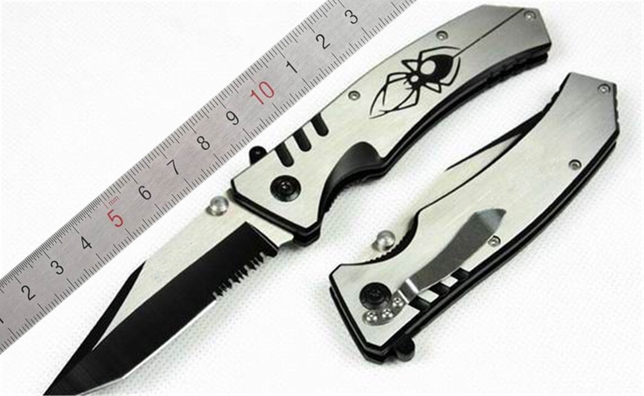 Spider web 063V High performance fast open folding knife 440C blade steel handle Camping Hunting tactical survival utility knife EDC tool
Spider web 063V High performance fast open folding knife 440C blade steel handle Camping Hunting tactical survival utility knife EDC tool