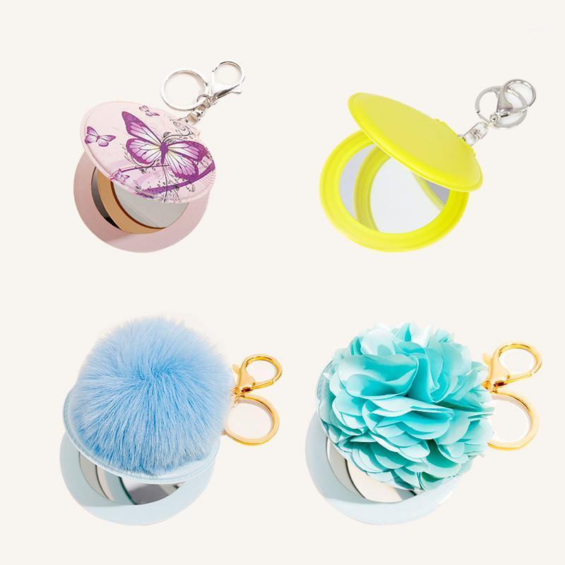 Portable PU multi-color makeup mirror gift key chain hair ball butterfly pattern flower shape multifunctional keychain1
Portable PU multi-color makeup mirror gift key chain hair ball butterfly pattern flower shape multifunctional keychain1