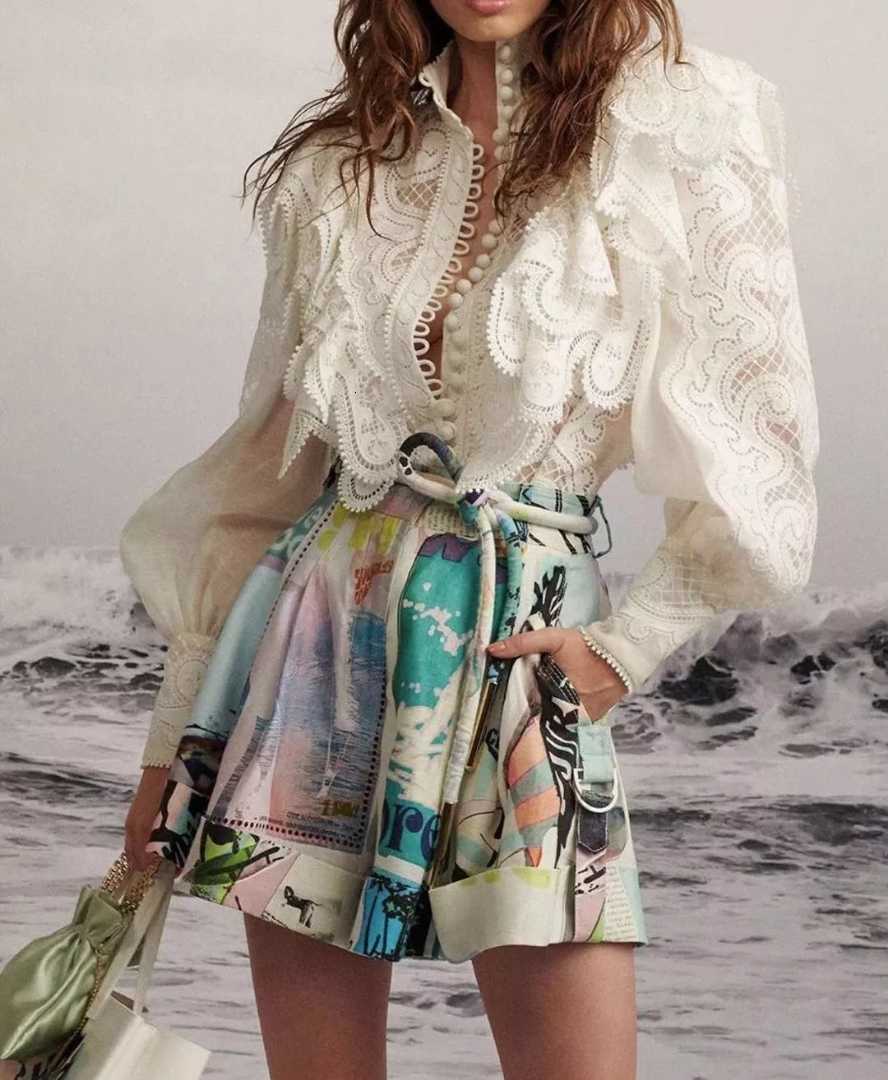 Australia catwalk lace ruffled lantern sleeves embroidered shirt + printed shorts, White a set
Australia catwalk lace ruffled lantern sleeves embroidered shirt + printed shorts, White a set