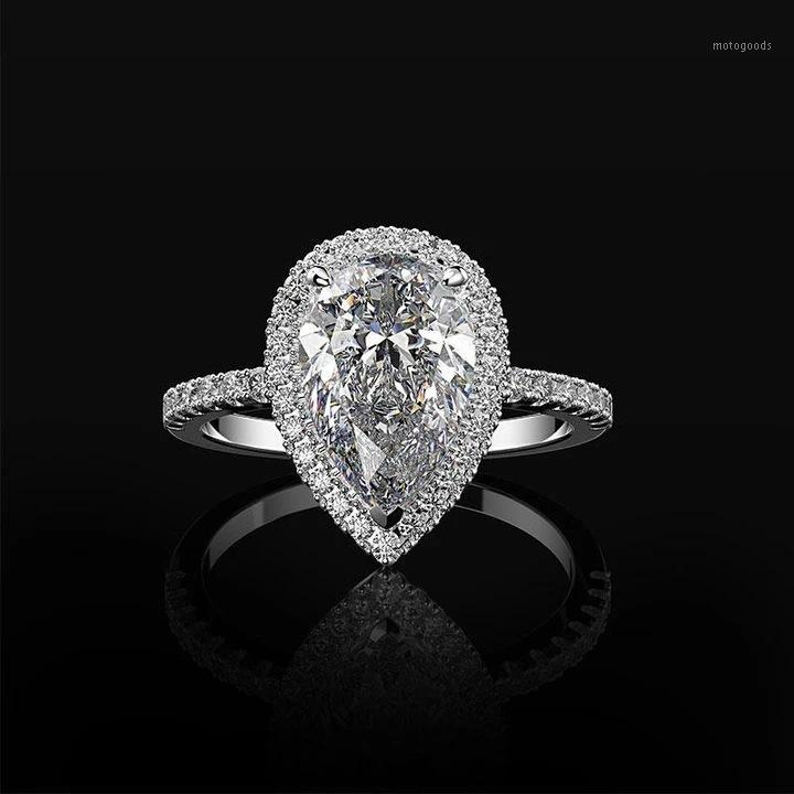 Exquisite Dazzling Silver Plated Water Drop Ring Elegant White Zircon Wedding Ring Cocktail Crystal Band Women Jewelry1
Exquisite Dazzling Silver Plated Water Drop Ring Elegant White Zircon Wedding Ring Cocktail Crystal Band Women Jewelry1