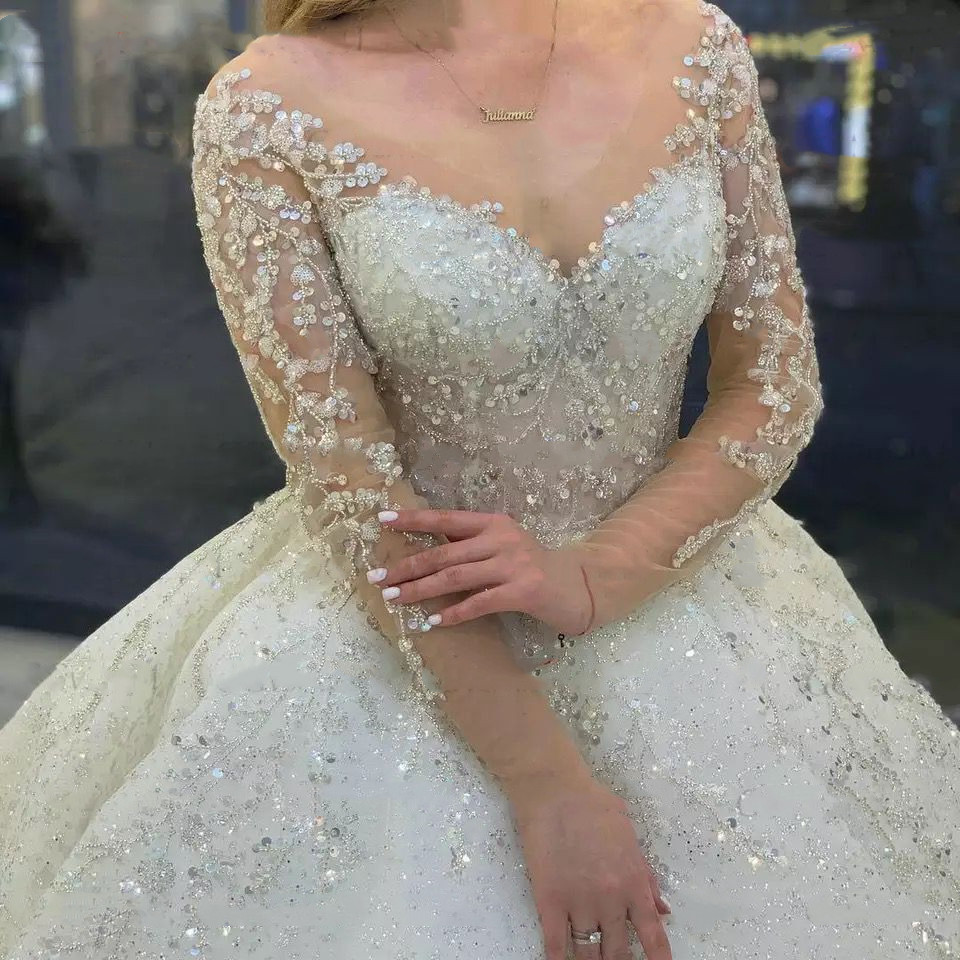 Dubai Luxury Crystals Beaded Ball Gown Wedding Dresses Glitter Sequins V-Neck Long Sleeve Bridal Gowns Chapel Bride Dress Custom Made