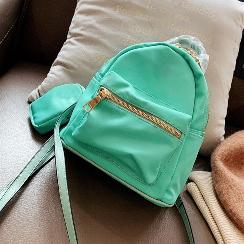 4 Colors Women Fashion Mini Backpack Nylon Top Designer Shoulder Bag High Quality Girl Backpacks Golden Zipper with Mini Coin Bags Wallet, Increase freight
4 Colors Women Fashion Mini Backpack Nylon Top Designer Shoulder Bag High Quality Girl Backpacks Golden Zipper with Mini Coin Bags Wallet, Increase freight