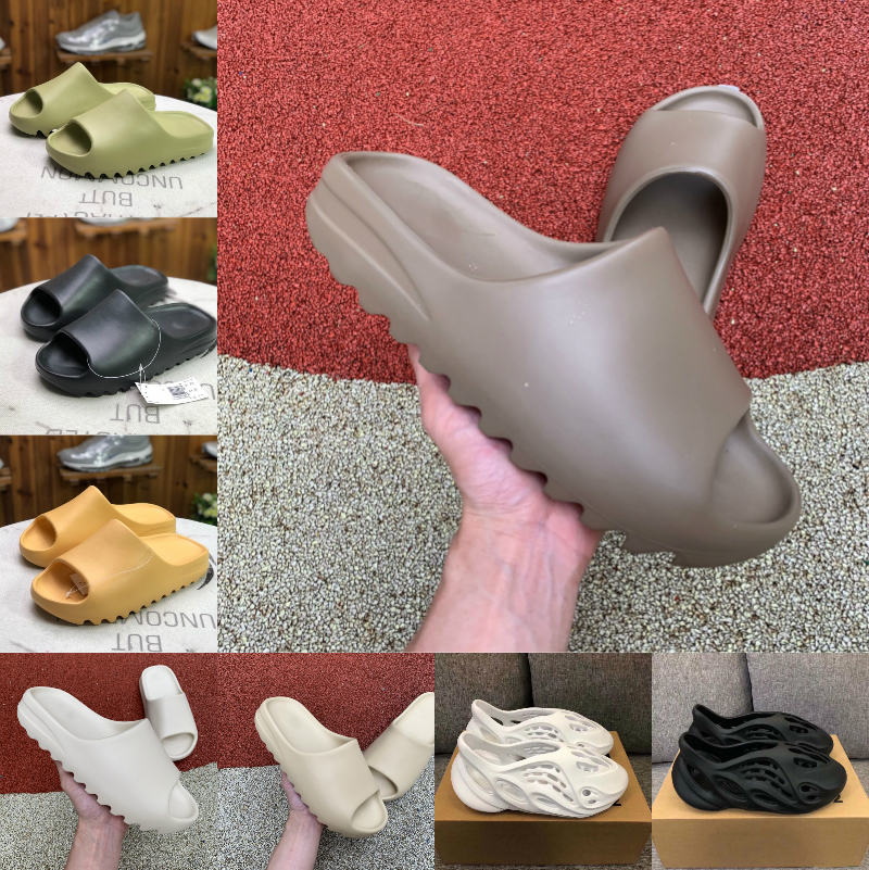 2021 New Kanye Slides Slippers Foam Runner West Desert Sand Triple Bone White Shoes Resin Solid Slide Sandal Women Mens Slipper Size 5-11
2021 New Kanye Slides Slippers Foam Runner West Desert Sand Triple Bone White Shoes Resin Solid Slide Sandal Women Mens Slipper Size 5-11