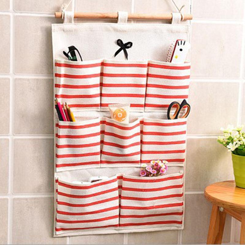 6/8 Pockets Wall Hanging Storage Bag Bow-knot Stripe Style Makeup Cosmetic Sundries Organiser Home Clothing Kitchen Holder Bags
6/8 Pockets Wall Hanging Storage Bag Bow-knot Stripe Style Makeup Cosmetic Sundries Organiser Home Clothing Kitchen Holder Bags