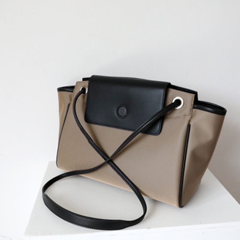 Oxford women's great capacity single shoulder panelled crossbody canvas bag with leather purse, Brown with khaki.
Oxford women's great capacity single shoulder panelled crossbody canvas bag with leather purse, Brown with khaki.