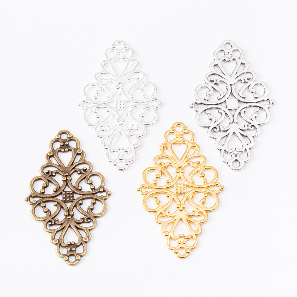 50pcs 41*25MM Tibetan silver color filigree flower charms antique bronze gold tone pendants for bracelet earring diy jewelry
50pcs 41*25MM Tibetan silver color filigree flower charms antique bronze gold tone pendants for bracelet earring diy jewelry