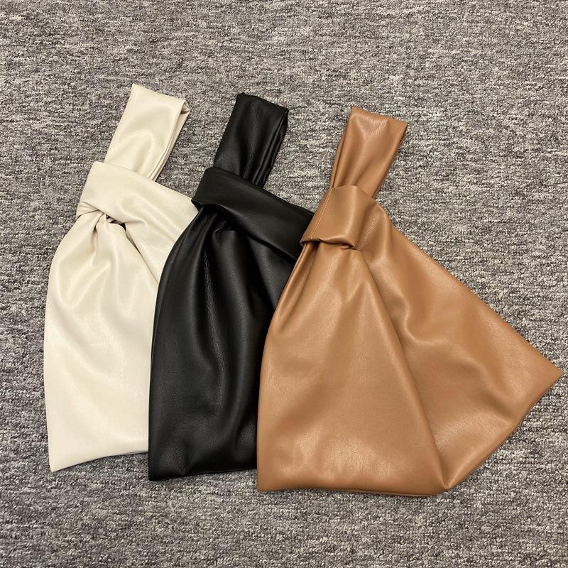 New 2021 Fashion Designer Imitation Leather Handbag Simplicity Knot Design Retro Vintage Large Capacity Portable Handbag
New 2021 Fashion Designer Imitation Leather Handbag Simplicity Knot Design Retro Vintage Large Capacity Portable Handbag