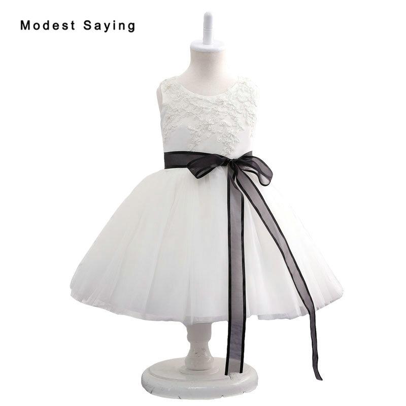 White Lace Flower Girl Dresses 2020 with Black Sash Ball Gown Pageant Gowns Beaded First Communion Dresses for Little Girls, Ivory
White Lace Flower Girl Dresses 2020 with Black Sash Ball Gown Pageant Gowns Beaded First Communion Dresses for Little Girls, Ivory