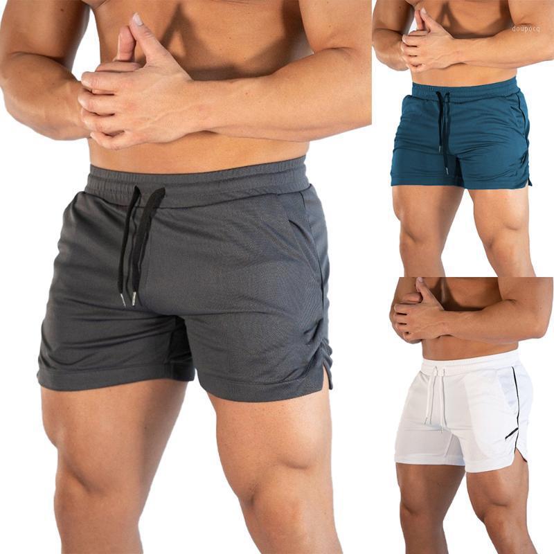 Men Gym Training Shorts Workout Sports Casual Clothing Fitness Running Shorts Male Short Pants Summer Beachwear Men D301, Blue
Men Gym Training Shorts Workout Sports Casual Clothing Fitness Running Shorts Male Short Pants Summer Beachwear Men D301, Blue